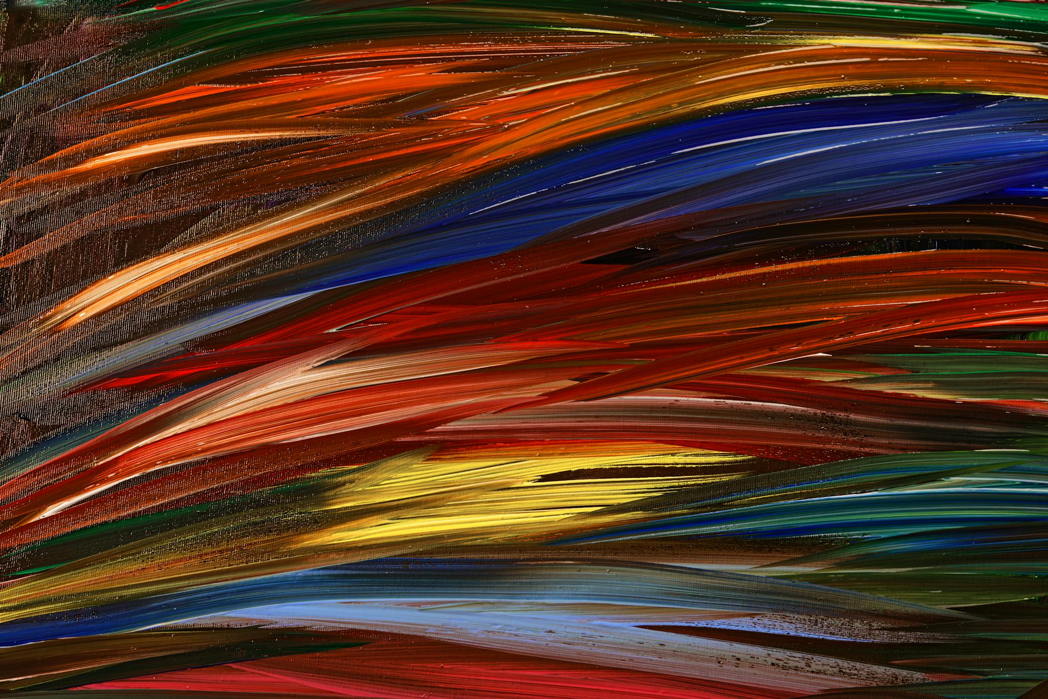 Colorful abstract oil painting featuring dynamic brushstrokes in red, blue, and yellow.